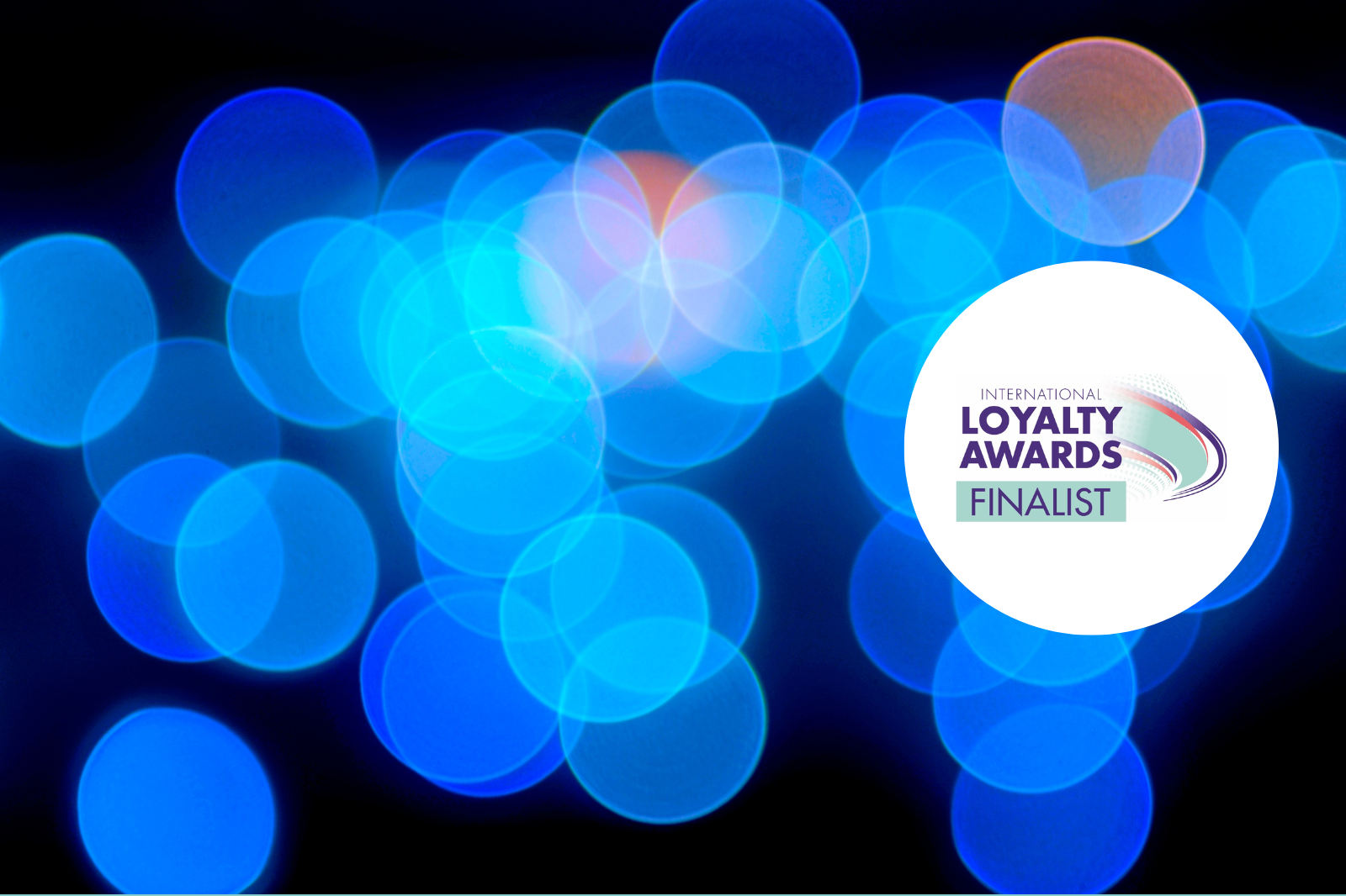 The Triple International Loyalty Awards 2022 finalists logo on a black background.