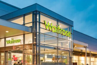 A store with a sign that says Wilfred's Waitrose and Partners.