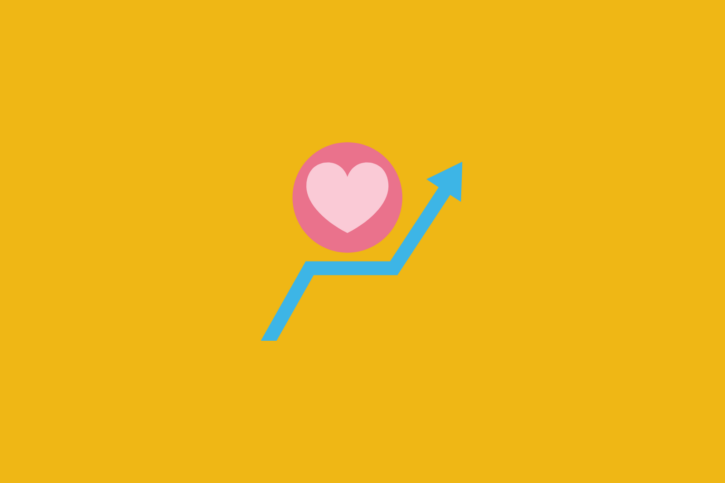 A pink heart on a yellow background.