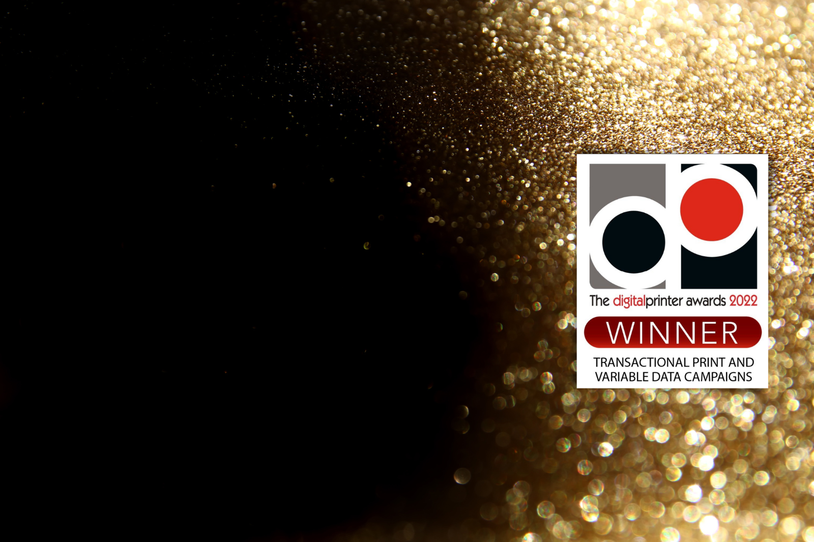 A black background showcasing the gold logo of Digital Printer Awards 2022 Winner.