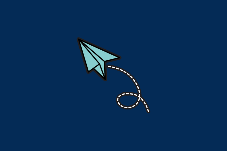 A print-enhanced paper airplane soaring on a blue background.